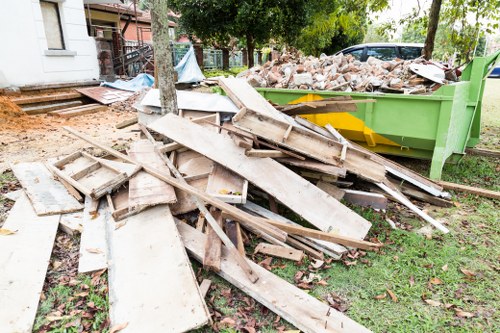 Construction site cleanup showcasing builders waste clearance in Esher