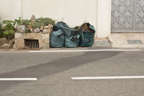 Waste removal truck in Esher